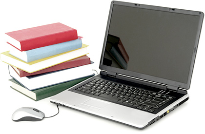 laptop and books